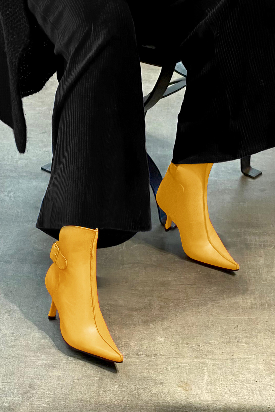 Mustard yellow women's ankle boots with buckles at the back. Pointed toe. High spool heels. Worn view - Florence KOOIJMAN